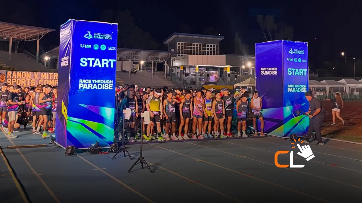 A group of runners is ready for the start of the International Marathon Palawan 2026, with Royce Outerwear Prints as the official supplier of running singlets and running gear.